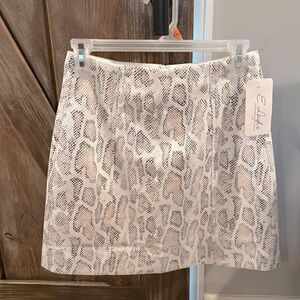 Faux leather sneak print mini skirt